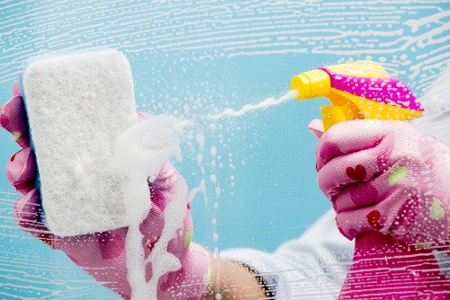 Commercial cleaners maintaining floors and high-touch areas in W3
