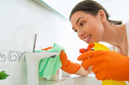 Detailed post-construction cleaning of kitchen surfaces and dust removal