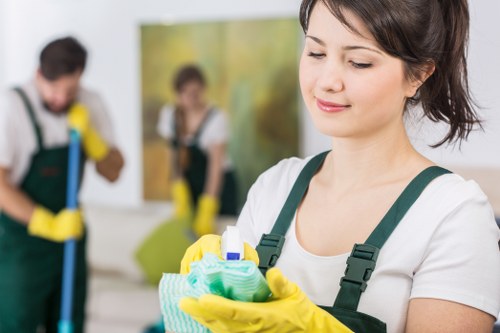 Local cleaner preparing a commercial workspace in W3