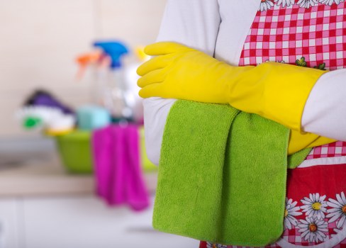 Technician treating stains on a mattress during a W3 cleaning service